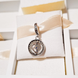 Charm Corazón Giratorio